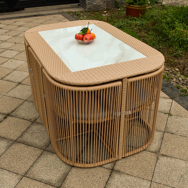 New outdoor courtyard table and chair combination rattan chair dining table villa garden hotel homestay rattan outdoor leisure furniture custom