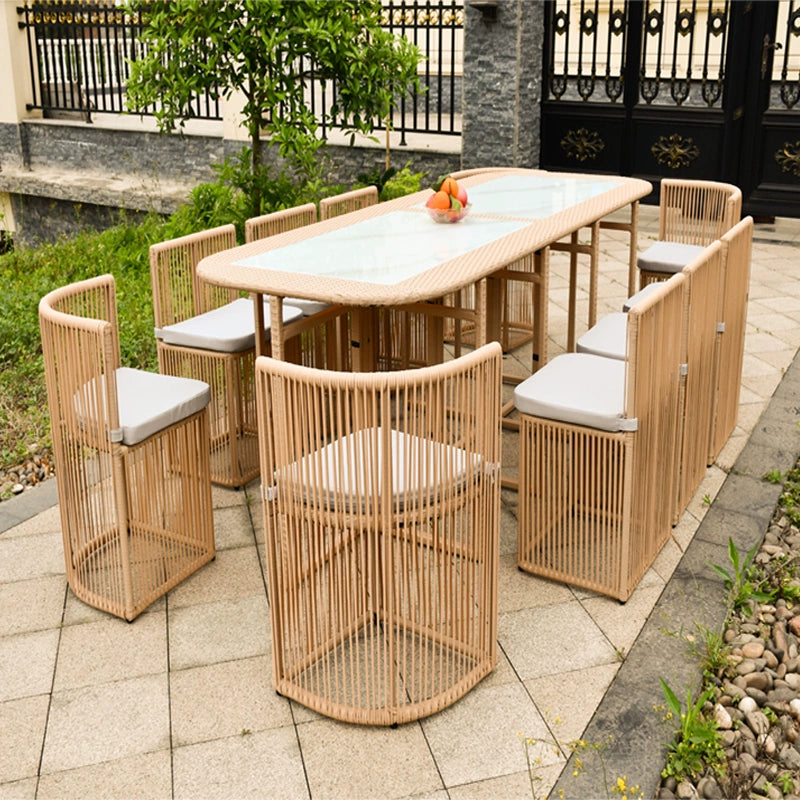 New outdoor courtyard table and chair combination rattan chair dining table villa garden hotel homestay rattan outdoor leisure furniture custom