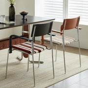 Dining chair household solid wood Internet celebrity chair Bauhaus designer stainless steel armrest soft bag chair