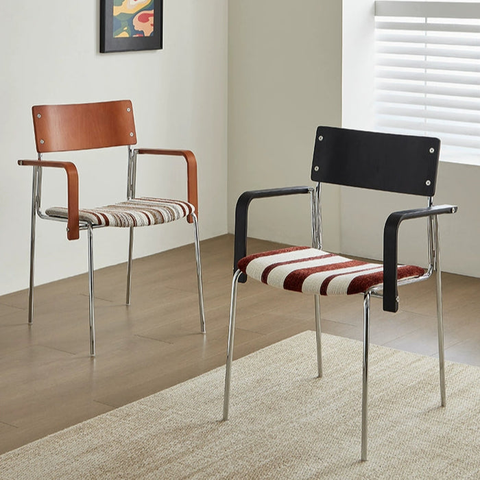 Dining chair household solid wood Internet celebrity chair Bauhaus designer stainless steel armrest soft bag chair