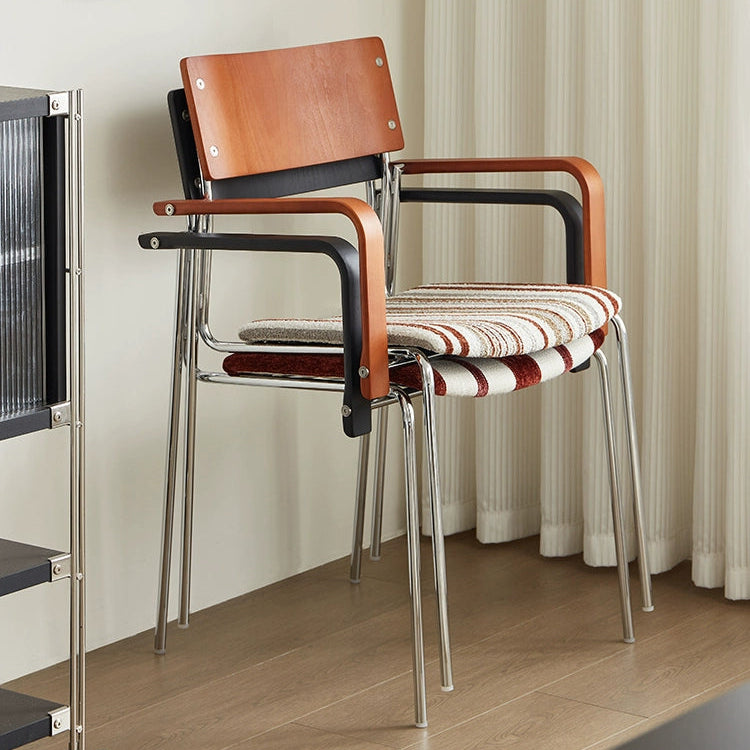 Dining chair household solid wood Internet celebrity chair Bauhaus designer stainless steel armrest soft bag chair