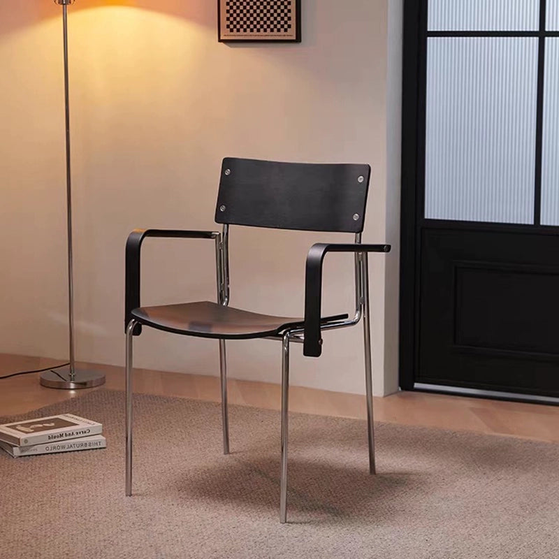 Dining chair household solid wood Internet celebrity chair Bauhaus designer stainless steel armrest soft bag chair