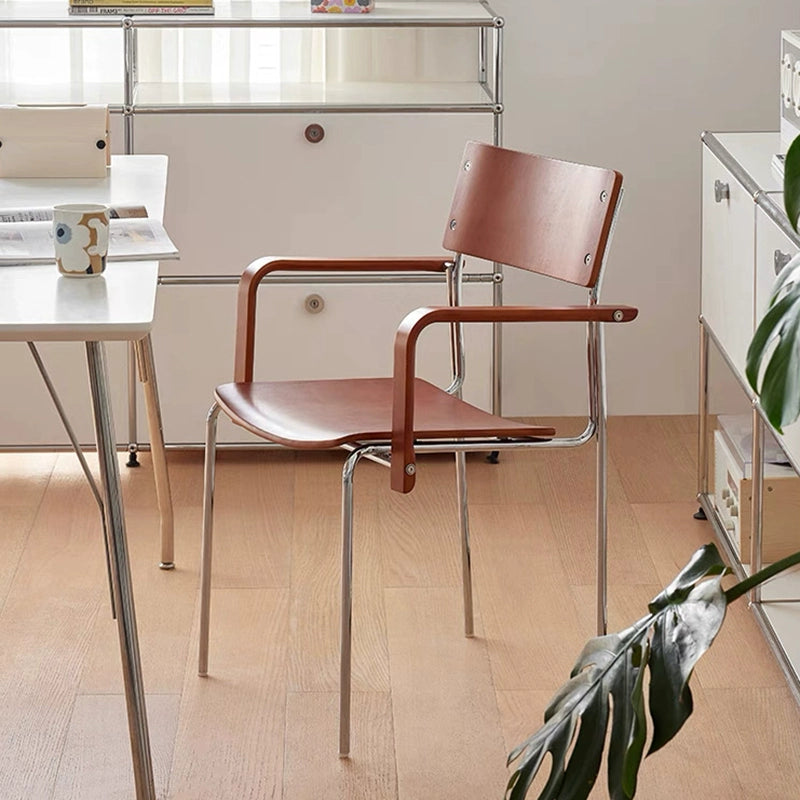 Dining chair household solid wood Internet celebrity chair Bauhaus designer stainless steel armrest soft bag chair