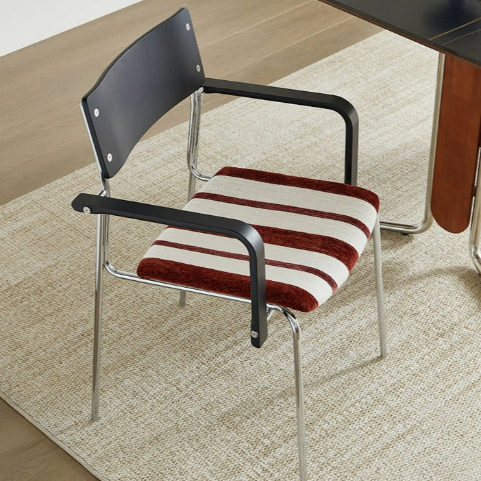 Dining chair household solid wood Internet celebrity chair Bauhaus designer stainless steel armrest soft bag chair