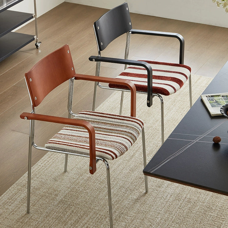 Dining chair household solid wood Internet celebrity chair Bauhaus designer stainless steel armrest soft bag chair