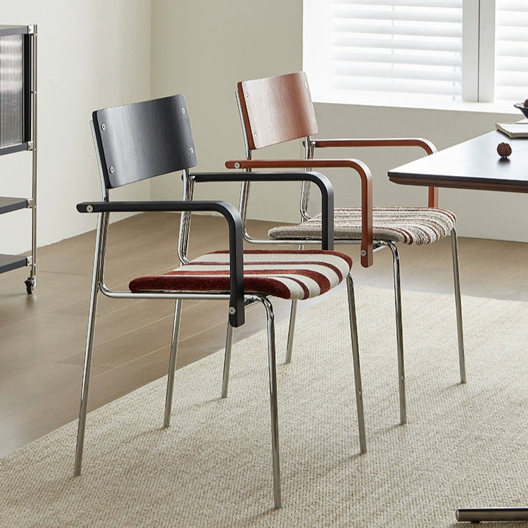 Dining chair household solid wood Internet celebrity chair Bauhaus designer stainless steel armrest soft bag chair